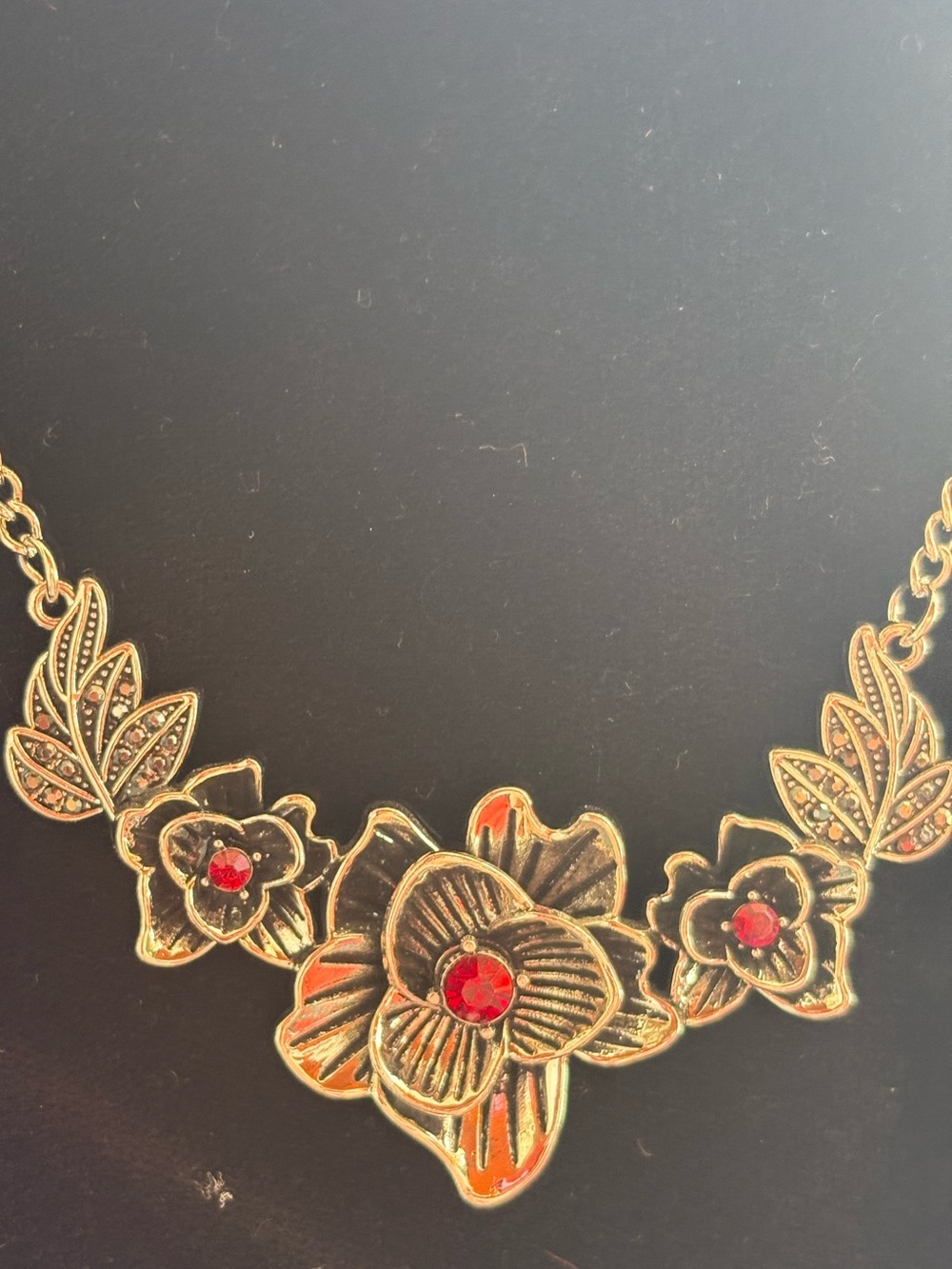 Silver Floral Statement Necklace with Red Stones